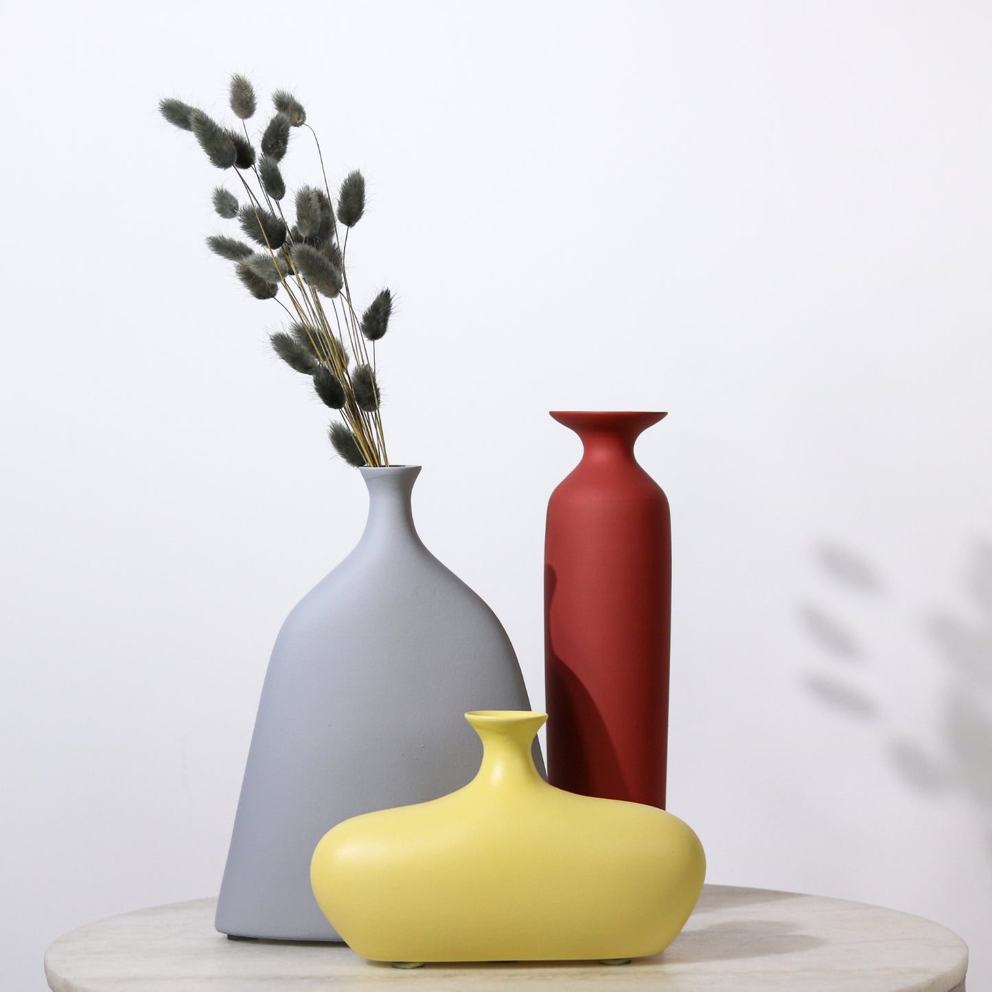 Customisable Bottle Vases.