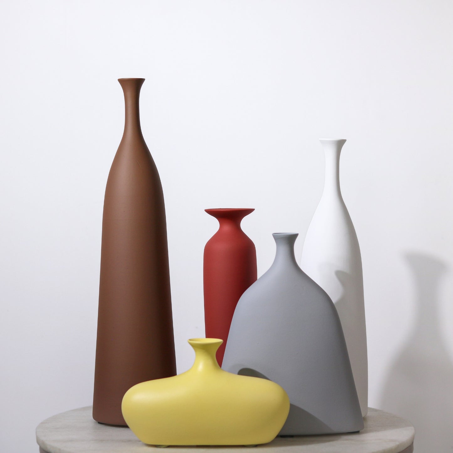 Customisable Bottle Vases.