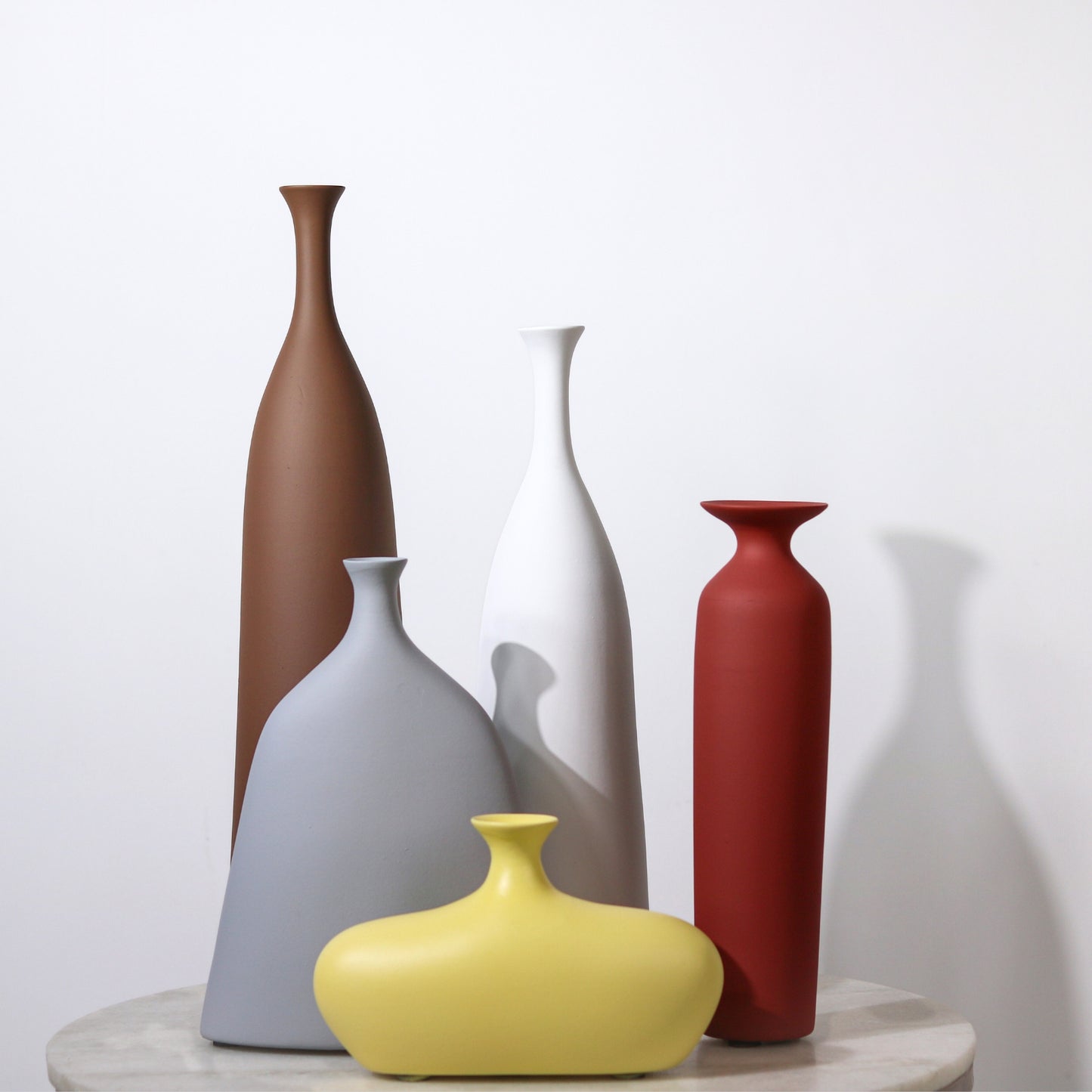 Customisable Bottle Vases.