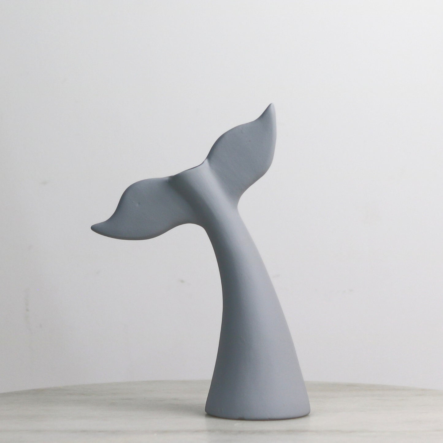 Customisable Whale-Tail Vase.