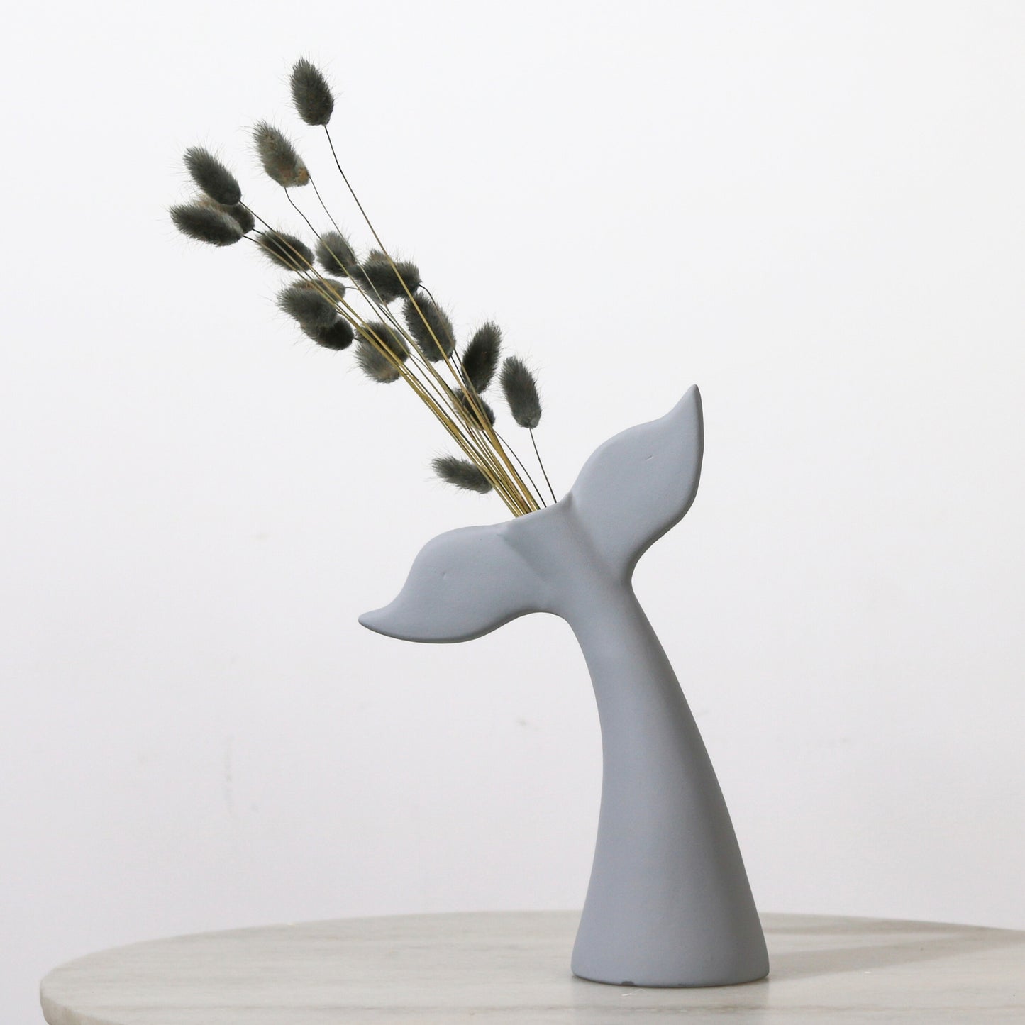 Customisable Whale-Tail Vase.