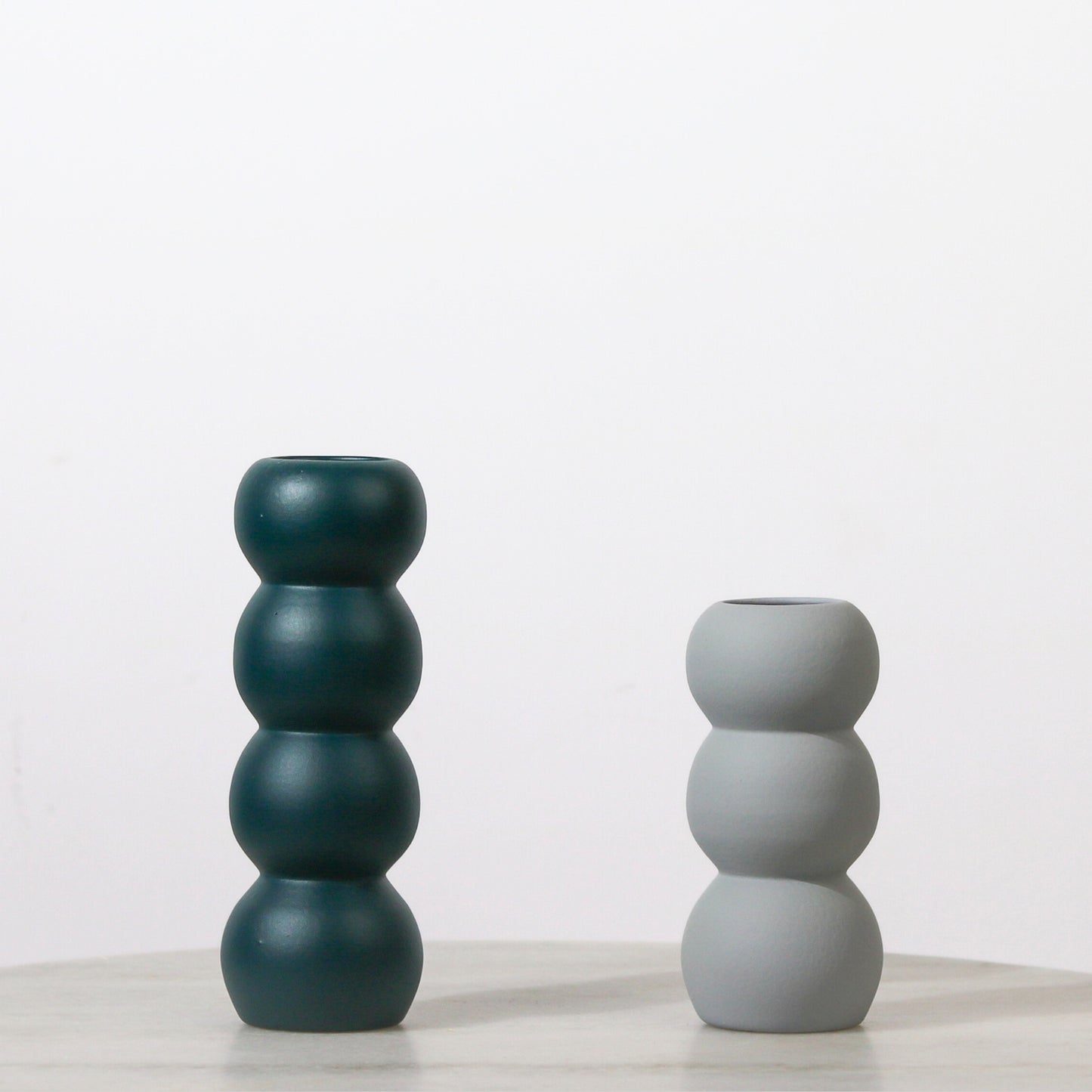 Customisable Orb Vases.