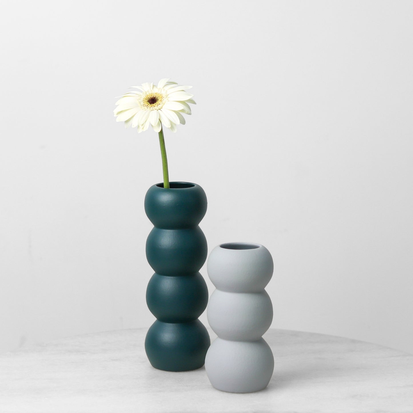 Customisable Orb Vases.