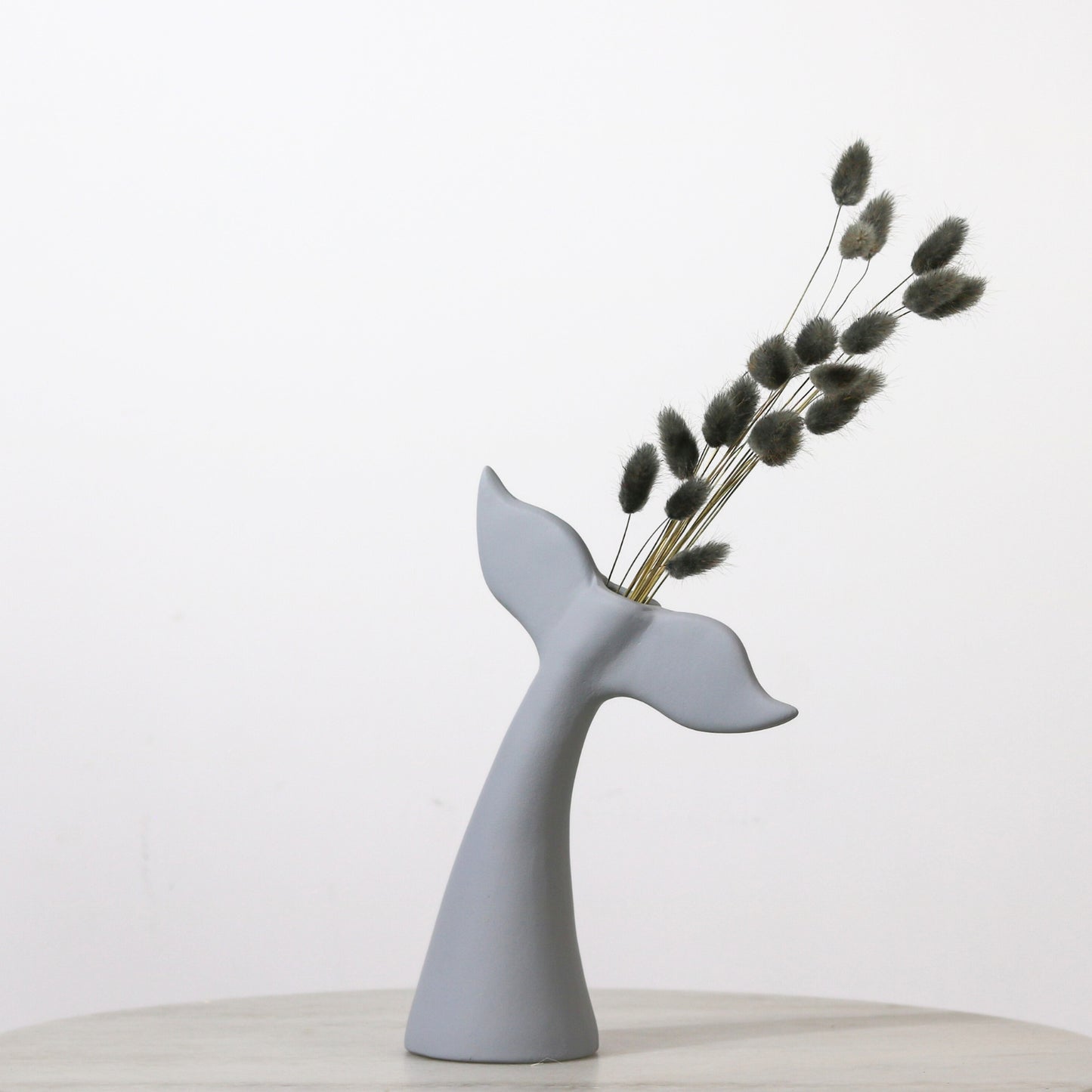 Customisable Whale-Tail Vase.