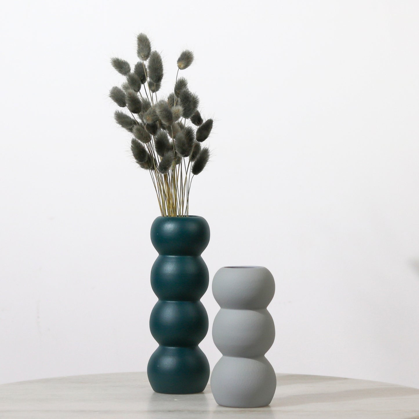 Customisable Orb Vases.
