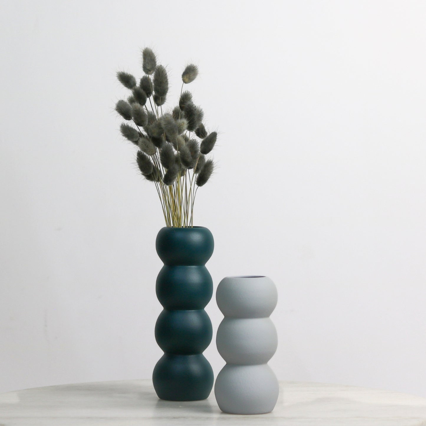 Customisable Orb Vases.